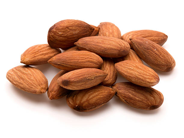 istock almond nuts isolated on white background close up 613110244