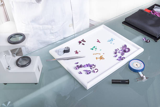 Gems and tools on the table gemologist. stock photo