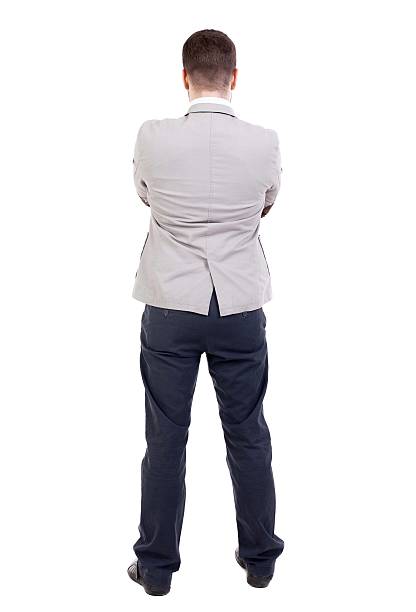 istock back view of Business man  looks. 613111596