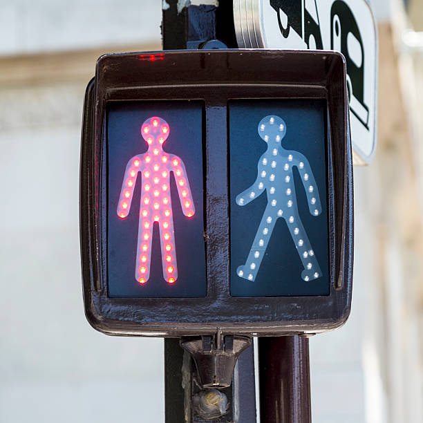 istock red traffic light for pedestrians in paris 613112954