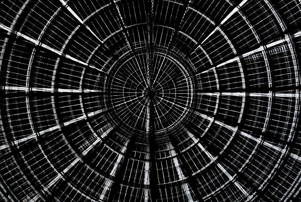 Detail of the ceiling of a modern building. Lines in prespective shaped by external sunlight. Useful background.
