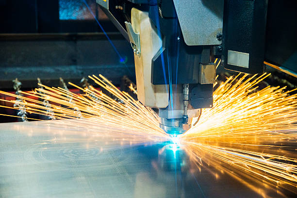 istock Metal laser-cutting tool cutting sheet metal. 613116110