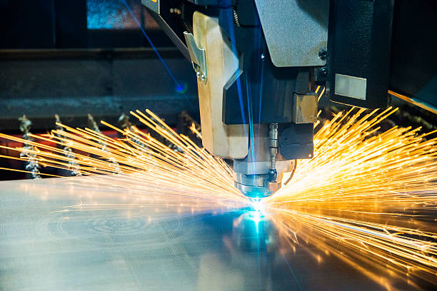 metal laser-cutting tool cutting sheet metal. - ncc imagens e fotografias de stock