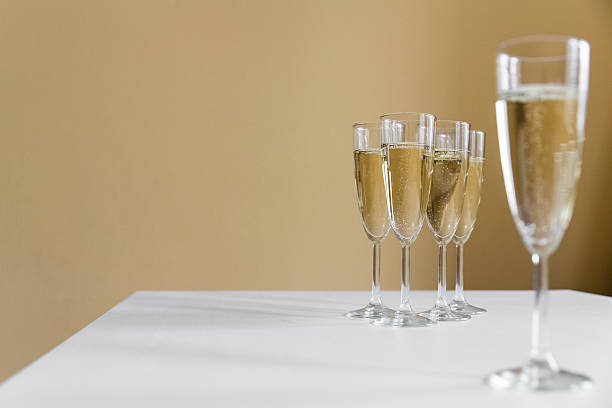 istock glasses of champagne on bright background 613117150