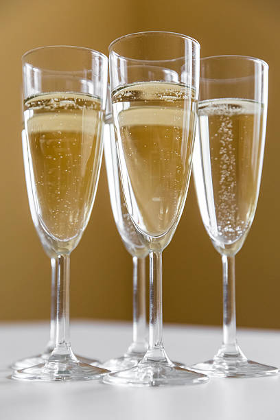 istock glasses of champagne on bright background 613117406