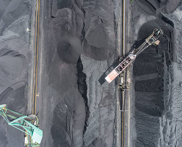 istock Mining excavator on the bottom surface mine. Brown coal deposits 613118006