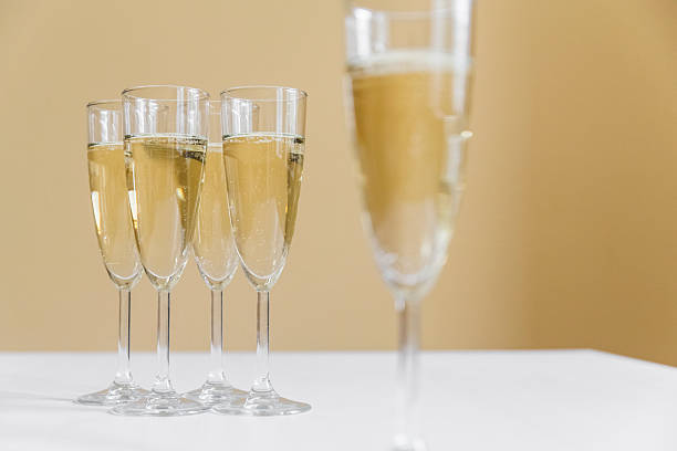 istock glasses of champagne on bright background 613118458