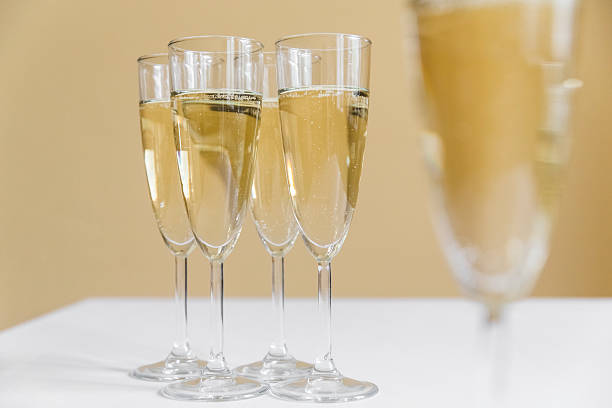 istock glasses of champagne on bright background 613118530