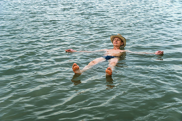 istock Man on the surface of the water 613118718