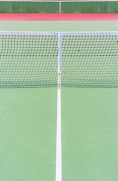 istock tennis court with nets 613118722