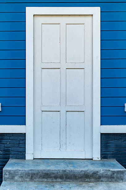 istock White wooden door 613121528