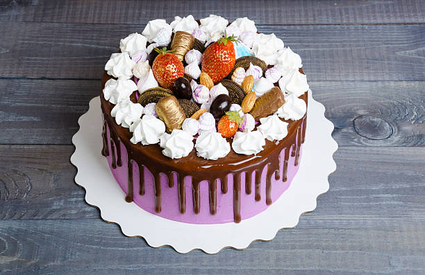 istock wedding anniversary cake with merengue and chocolate decoration 613121600