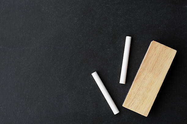 chalk and eraser on chalkboard
