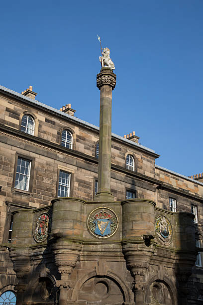 istock Mercat Cross (1882) and Parliament Square, Edinburgh 613125292
