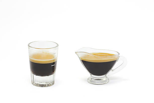 istock Hot coffee espresso shot in white background 613125508
