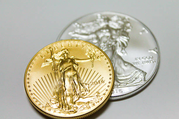 gold and silver coin top view close up - coin collection imagens e fotografias de stock