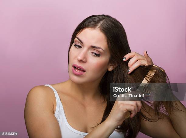 Woman Brushing Her Hair Stock Photo - Download Image Now - Adult, Arts Culture and Entertainment, Beautiful People