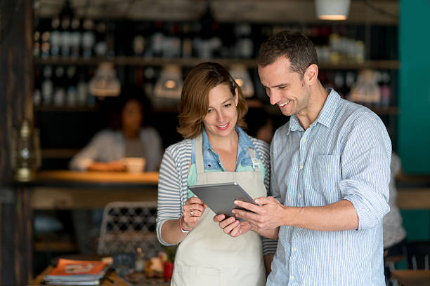 istock Woman talking to manager at a restaurant 613132020