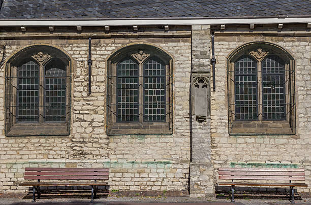 istock Benches at the Great Church in Alkmaar 613137828