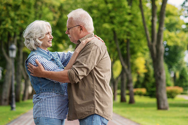 istock Mature husband and wife hugging with happiness 613140668