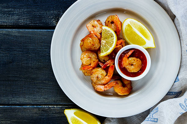 istock Roasted prawns with sauce 613141058