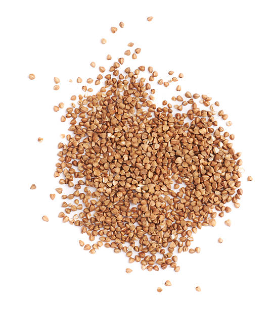 istock Pile of buckwheat seeds isolated 613141594
