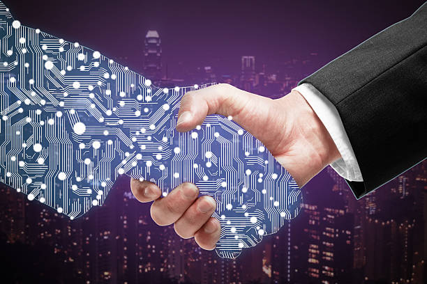 istock Businessman shaking digital hand 613142236