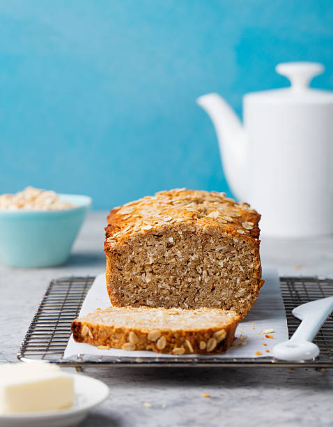 istock Healthy vegan oat and coconut loaf bread, cake 613143570