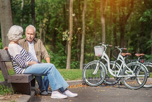 istock Old husband and wife having rest in nature 613144830