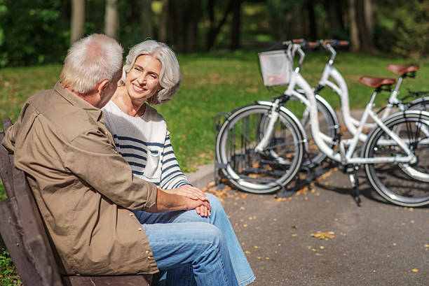 istock Joyful mature couple talking in nature 613144902