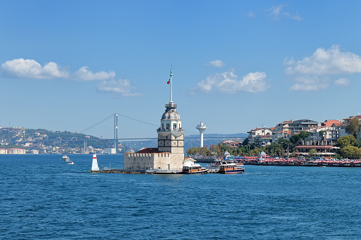 View at Maiden tower and suspension bridge over the Bosphorus in Istanbul, Turkey
