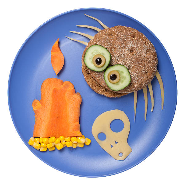 istock Halloween spider made of bread on plate 613147696
