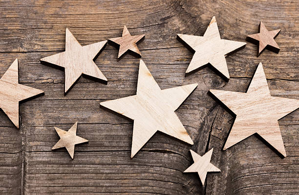 istock Stars on wooden background 613148108