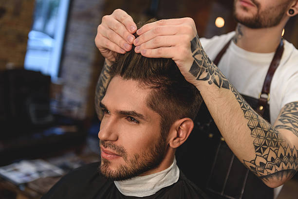 istock stylist working with hair 613209184