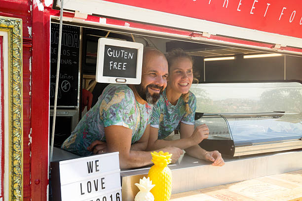 istock Food truck and owners 613209436