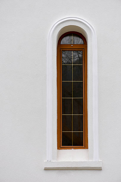 istock Side window of a church in natural light 613209480