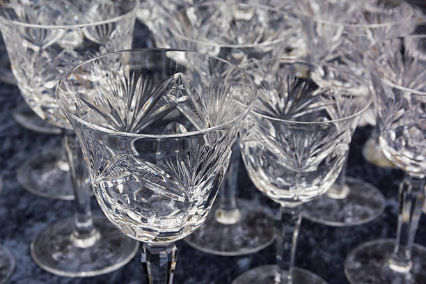 istock Fine Crystal Glasses Shining Felt Table Product Drinking Gastron 613209786