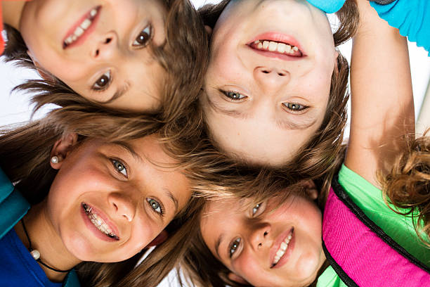 istock Elementary-age children, friends on school campus. 613211526