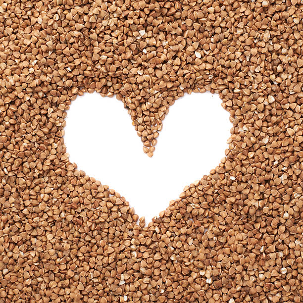 istock Heart shaped frame made of buckwheat 613211948