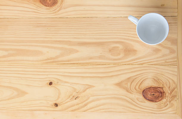 istock White glass and wooden tables. 613213138