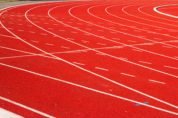 istock track running, Red treadmill in sport field. soft focus 613213924