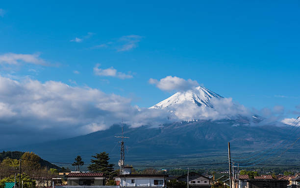 istock Fuji Mountain view from Japanese countryside town 613213978