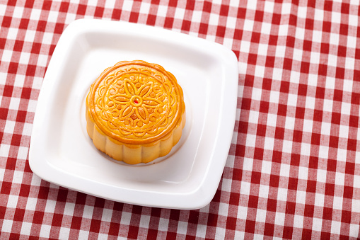 Chinese mid autumn festival foods. Traditional mooncakes on table.