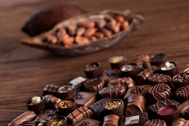 istock Praline Chocolate on wooden backgroud 613214650