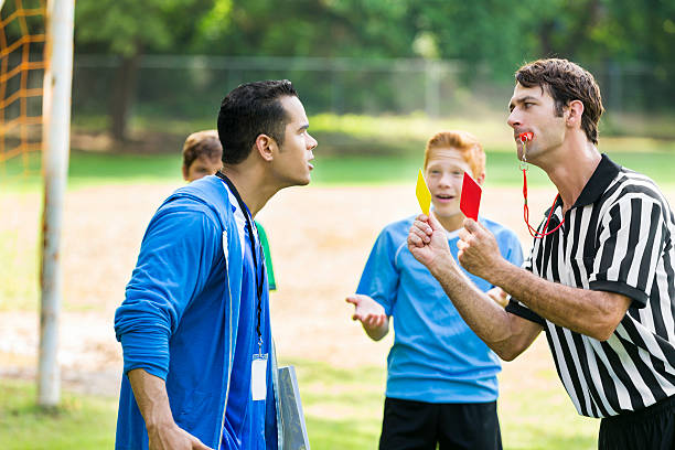 istock Soccer coach argues with referee about penalty call 613216634