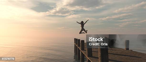 Woman Jumping Stock Photo - Download Image Now - Jumping, Life Events, Lake
