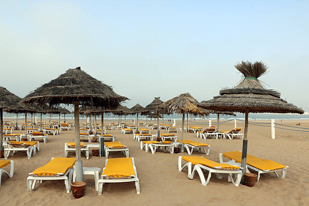 istock Umbrellas on the beach on a summer day 613220380