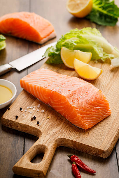 istock Salmon fish on the cutting board 613221770