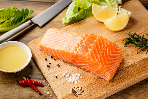 istock Salmon fish on the cutting board 613221822