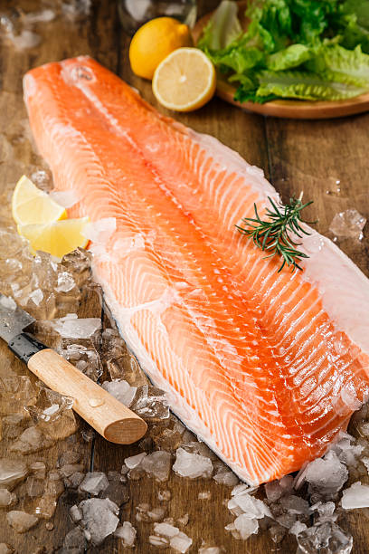 istock Salmon fish on the wooden table 613221926
